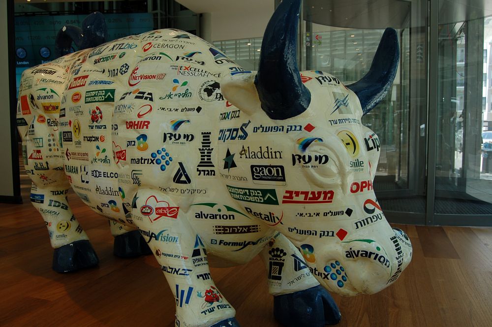 A bull inscribed with the names of TASE-listed companies projects confidence in Israel's economy
(Photos:  James S. Galfund)